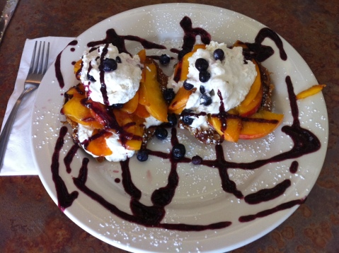 Croissant_French_Toast_with_Long_Island_Peaches_Blueberries_Fresh_Whipped_Cream